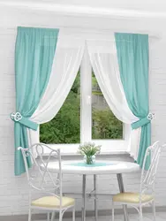 Mint curtains in the kitchen interior photo