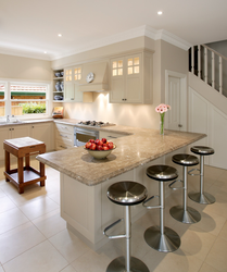 Interior of a bright kitchen with a bar counter