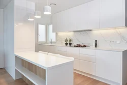 White kitchens up to the ceiling with wood photo