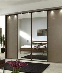 Photo of wardrobes with a mirror in the bedroom photo
