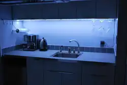 Photo of a kitchen with backlit tape