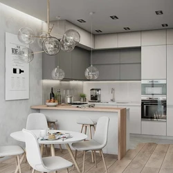 Gray kitchen with white table photo