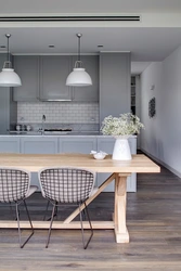 Gray Kitchen With White Table Photo