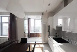 Kitchen design with two windows and a balcony