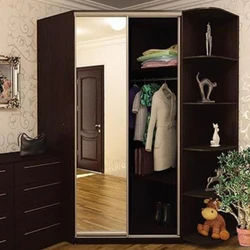 Corner wardrobe in the hallway with a mirror photo design