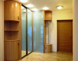 Corner wardrobe in the hallway with a mirror photo design