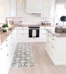 Apron and floor for a white kitchen photo