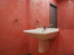 Decorative plaster for walls in the bathroom interior photo
