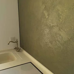 Decorative plaster for walls in the bathroom interior photo