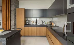 Gray kitchen with wooden facades interior