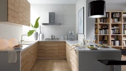 Gray kitchen with wooden facades interior