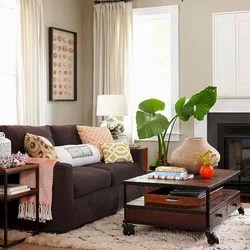 Bright living room with brown sofa photo