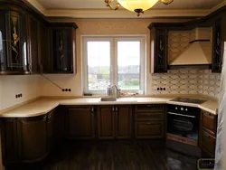 Kitchen design with one window in the middle