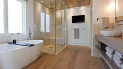 Photo of bathrooms with floor-to-ceiling shower