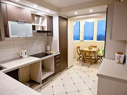 Photos of corner kitchens with a balcony