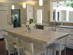 Photo of kitchen tables made of artificial stone