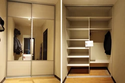 Wardrobe in the hallway with a mirror photo inside