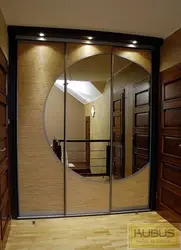 Wardrobe in the hallway with a mirror photo inside