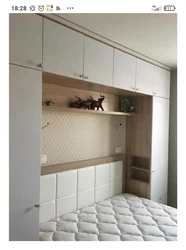 Built-in shelves in the bedroom photo