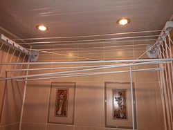 Ropes in the bathroom for drying clothes photo