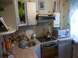 Design Of A Small Apartment Kitchen With A Gas Water Heater