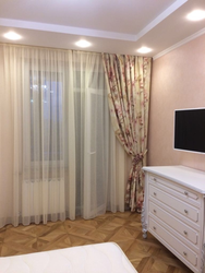 Design of curtains for a window with a balcony door in the bedroom