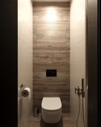 Toilet in apartment finished with laminate photo