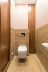 Туалет у кватэры аздабленне ламінатам фота