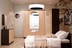 Bedrooms with corner wardrobe design and bed