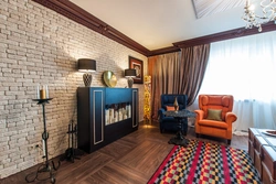 Wallpaper And Decorative Brick In The Living Room Interior Photo