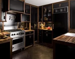 Темный кухонный гарнитур в маленькой кухне фото
