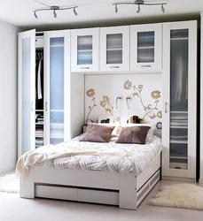 Bedroom design bed and small wardrobe
