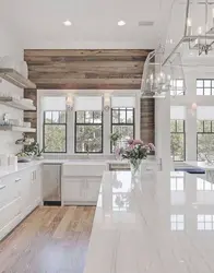 White kitchen in a wooden house design