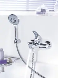 Bath mixer with spout and shower photo