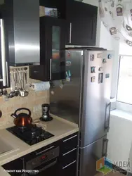 Small kitchen design with refrigerator and dishwasher Khrushchev