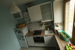 Kitchen In A Five-Story Building With A Refrigerator Photo