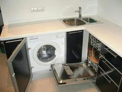 Photo of a kitchen with a dishwasher and washing machine photo