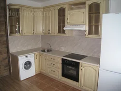 Photo Of A Kitchen With A Dishwasher And Washing Machine Photo
