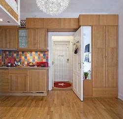 Kitchen interior with door to room
