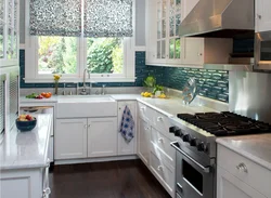 Kitchen corner photo with sink by the window