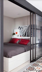 Design of a sleeping place in a one-room apartment photo