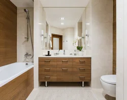 Combination of tiles and wood in the bathroom interior