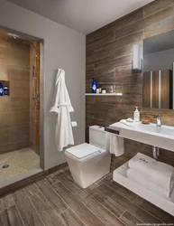Combination Of Tiles And Wood In The Bathroom Interior