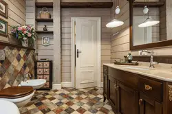 Combination of tiles and wood in the bathroom interior