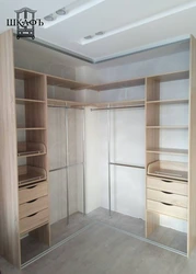 Photo of corner wardrobes in the bedroom interior
