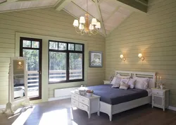 What color to paint the walls in a wooden house in the bedroom photo