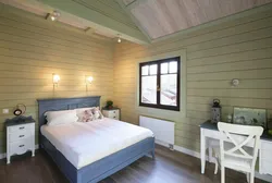 What color to paint the walls in a wooden house in the bedroom photo
