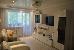 Room design in a one-room apartment with a balcony photo