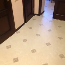 Porcelain Stoneware Floors In The Kitchen And Hallway Photo