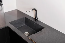 Photo of kitchen sinks made of artificial stone in the interior photo